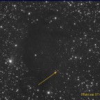 Pluto im Juli 2010 bei der Dunkelwolke Barnard 92